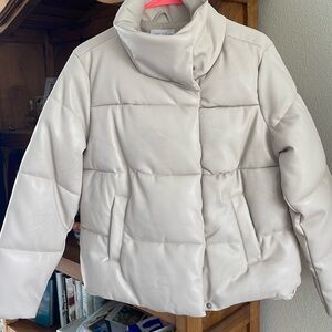 Cream colored lined puffer jacket